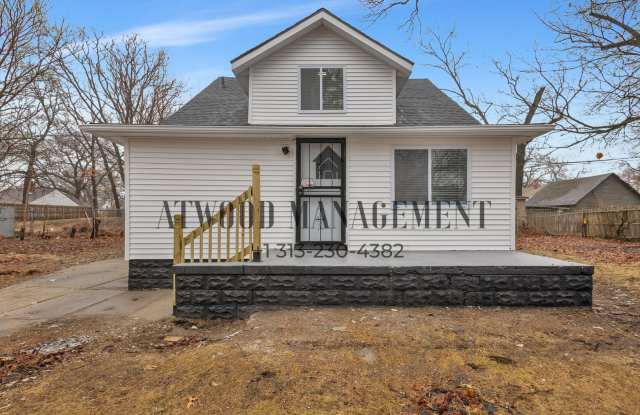 This beautifully updated 4-bedroom, 1-bath single-family home is ready for move-in! photos photos