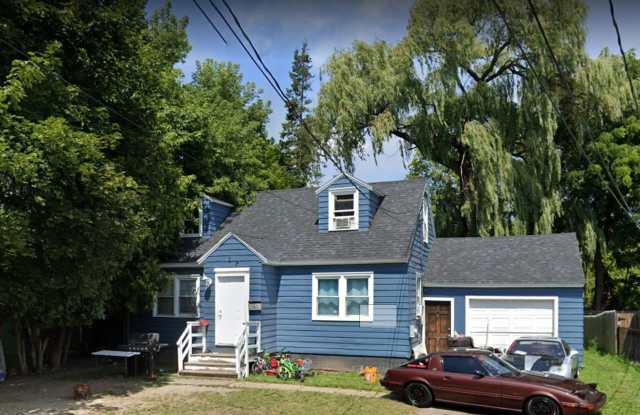 Lovely Home! Spacious home! Large front & back yard! Garage! photos photos