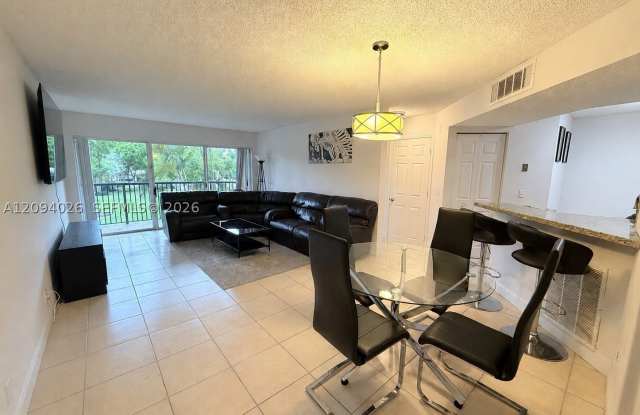 8741 Wiles Rd Gallery 1