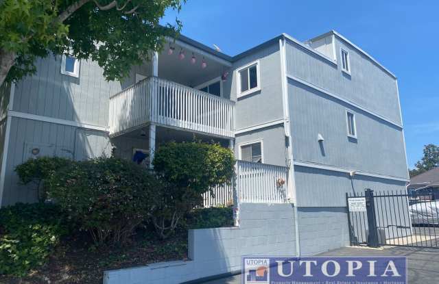 Spacious, sunny two-bedroom, two-bath condo is only a few short blocks to the Beach Boardwalk photos photos