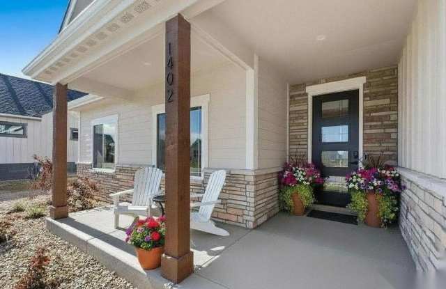 Stunning 5-Bedroom Ranch Home with Sunroom & Oversized 4-Car Garage in Berthoud! Gallery 3