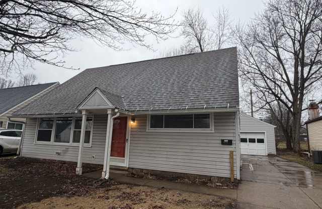 Charming 3-Bedroom Home in Cuyahoga Falls with Flexible Living Space  Fenced Yard! photos photos