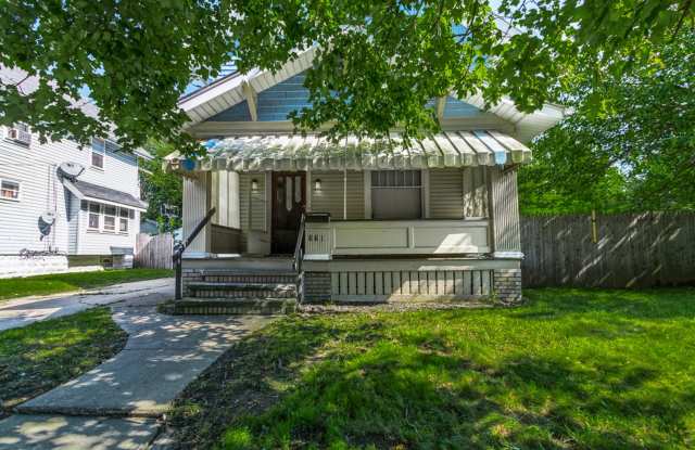 Charming 3BR Home with Classic Woodwork, Porch & Bonus Attic Space photos photos