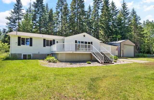 Dream Retreat on a Private Acre with Lake Views & Heated Shop Gallery 1
