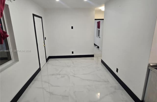 77 NW 51st St - 77 Northwest 51st Street, Miami, FL 33127