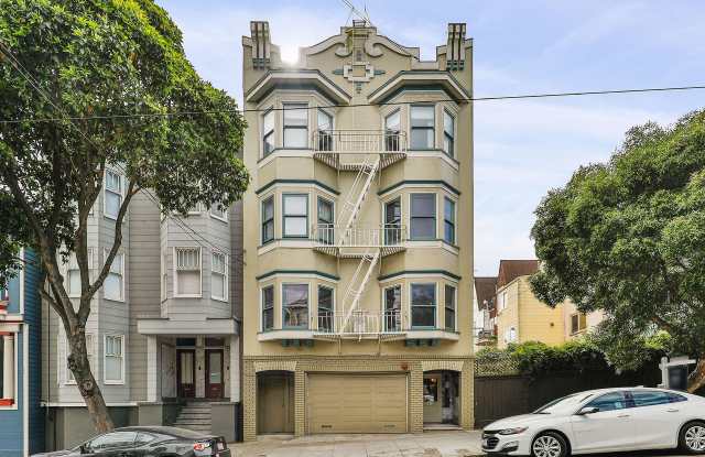 Cole Valley: Bright Top Floor Unfurnished 1 Bed 1 Bath with Garage Parking - 135 Carl Street, San Francisco, CA 94117