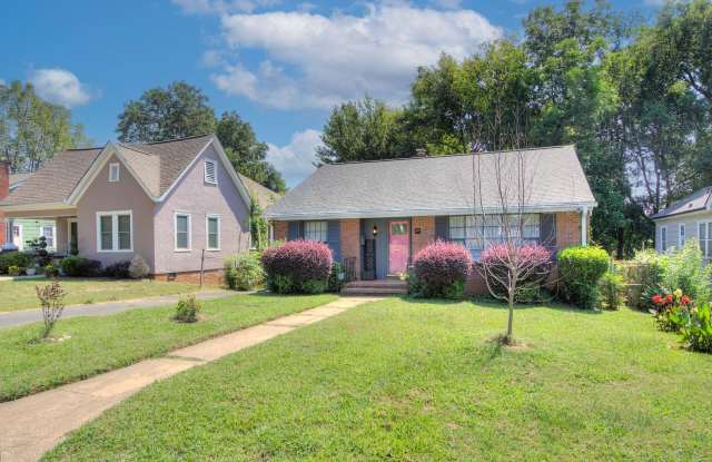 Discover this beautifully updated full brick single-family home in the heart of the historic Wesley Heights neighborhood, just minutes from Uptown Charlotte Gallery 4