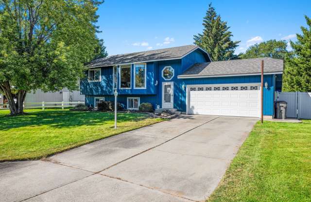 Updated 4BR Split-Level in Spokane Valley - Deck, 2-Car Garage & Daylight Basement photos photos