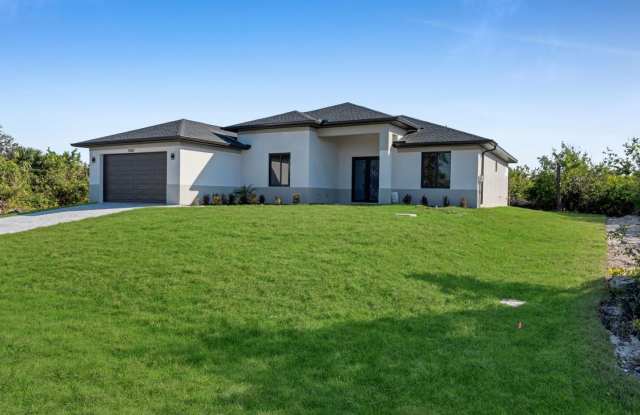 Brand-New Home for Rent – Port Charlotte, FL 33981. Qualify for a deposit-free option and save on move-in costs! - 14207 Fort Worth Circle, Charlotte County, FL 33981