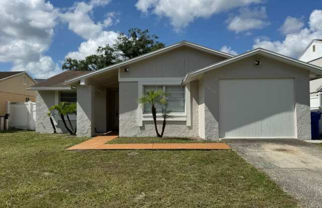 Freshly Updated Lake‑Front Retreat in Desirable Carrollwood Area photos photos