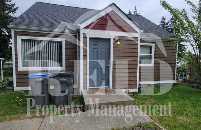 Centrally Located Bremerton Home With Partial View of Sinclair Inlet from Deck photos photos