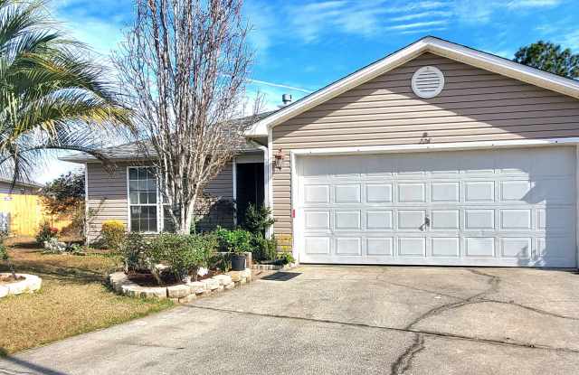 Spacious 3/2 Home W/ Sunroom and Fenced Backyard in North Pensacola! photos photos