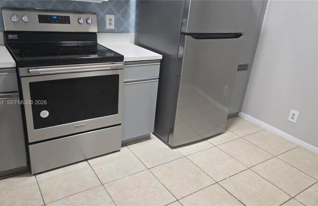 8901 Wiles Rd photos photos