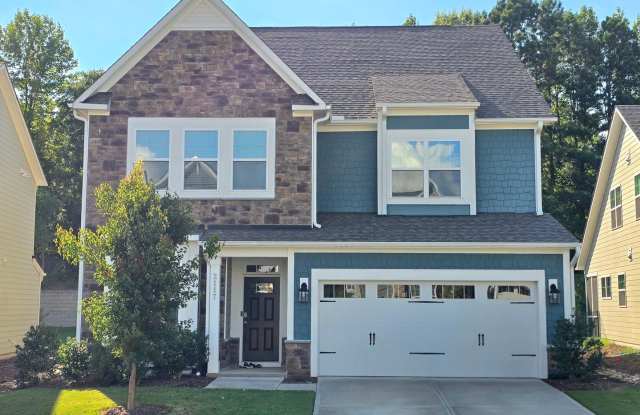 Brier Creek Living in a 5 Bedroom 4.5 Bathroom w/ Guest Suite, Formal Dining and Bonus room! Gourmet Kitchen, private backyard, and screen in back porch! Tesla Charger! photos photos