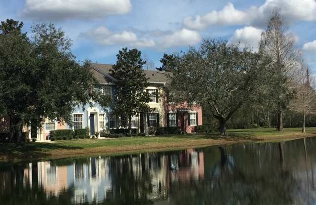 Beautiful Avalon Park Townhome – Water Views, First-Floor Primary Suite & Loft! Gallery 1