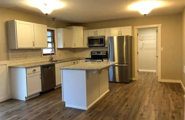 Spacious, stylish, and perfectly located—this beautifully updated 3-bed, 2-bath home near Mercy Hospital offers modern comfort, hardwood floors, and a private fenced yard in the heart of Springfield. photos photos