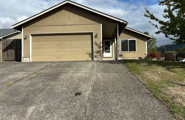 Three Bedroom Home with an Attached Garage Gallery 1