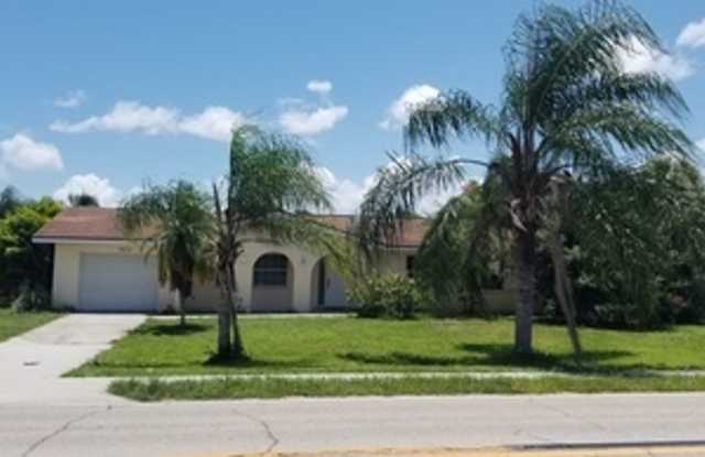 Centrally located 3-bedroom, 2 bath unfurnished single family home in non-deed restricted popular San Carlos Park Gallery 1