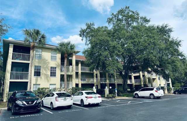 Stunning 2BR/2B Corner End Unit Available Now on the First Floor Nestled Amidst Mature Landscaping - 2690 Coral Landings Boulevard, Palm Harbor, FL 34684