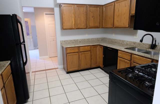 Must see in person! Well maintained 3 Bed 2.5 bath condo in a very quiet location. 2 car detached. Full unfinished basement w/shelving. Gallery 1