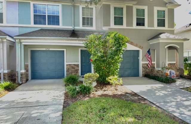 Waterfront Living in a Gated Community – Lawn Care, Garage. and Amenities Included! - 5760 Sandstone Way, Jacksonville, FL 32258