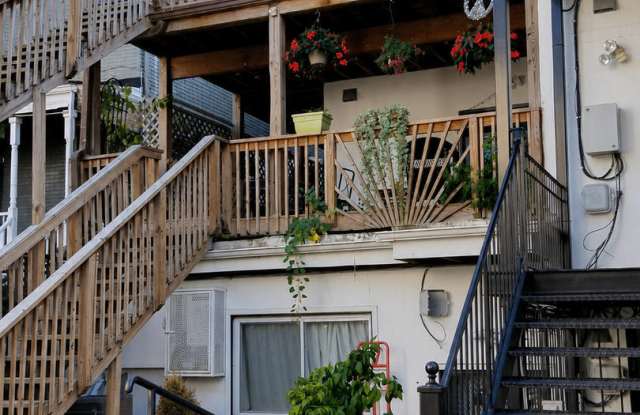 Updated One-Bedroom with In-Unit Laundry and Private Porch Near Shaw Gallery 2