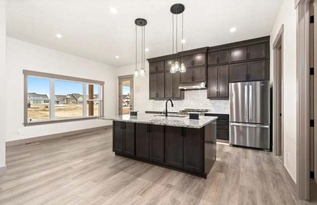 Stunning 5-Bedroom Ranch Home with Sunroom & Oversized 4-Car Garage in Berthoud! Gallery 4
