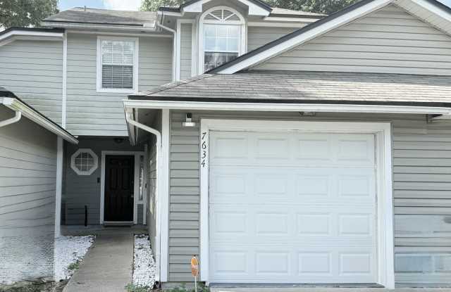 Peaceful Townhome in Fort Caroline with Fully Fenced Backyard photos photos
