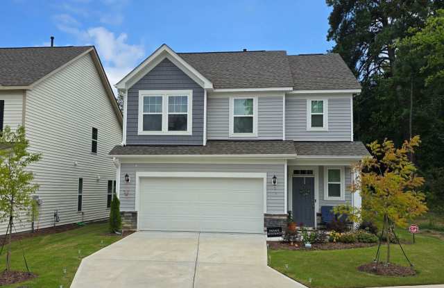 Centrally located, brand new 3-bedroom, 2.5-bathroom w/ Lawncare included photos photos