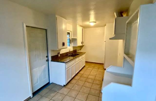 NEW RECUDED PRICE!!! Welcome to the heart of Bakersfield, where this charming duplex is ready to become your new home! Gallery 3
