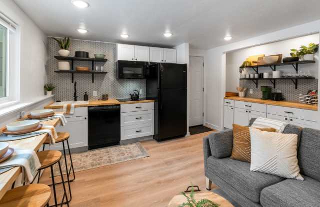 Stylish  Turnkey Furnished 2-BR Daylight Basement Apartment – Utilities + Wi-Fi Included photos photos