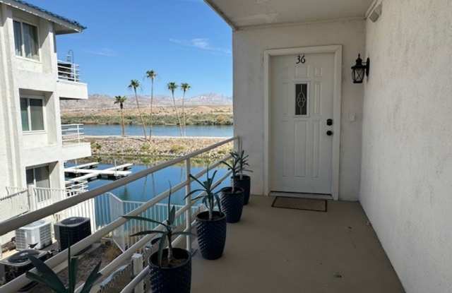 2BR 2BA Furnished Vacation Condo Waterfront ground level w/ Garage  Include Utilities! photos photos