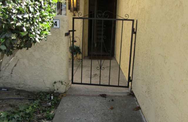 Centrally Located Large Two Story Condo with Two Car Garage Gallery 2