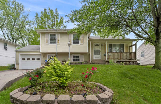 NEW Lower Rate! Beautiful 4 Bedroom Home with extension work garage/work space photos photos
