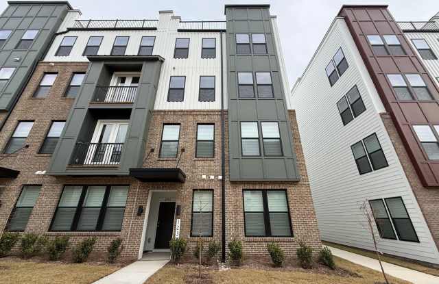 **OFFERING FIRST MONTH'S RENT FREE, $200 MOVE IN PROMOTION  REFUNDABLE APPLICATION FEES** New Construction 3BD, 2.5BA Raleigh Townhome-Style Condo with 1-Car Attached Garage  Rooftop Terrace in Downtown Raleigh photos photos