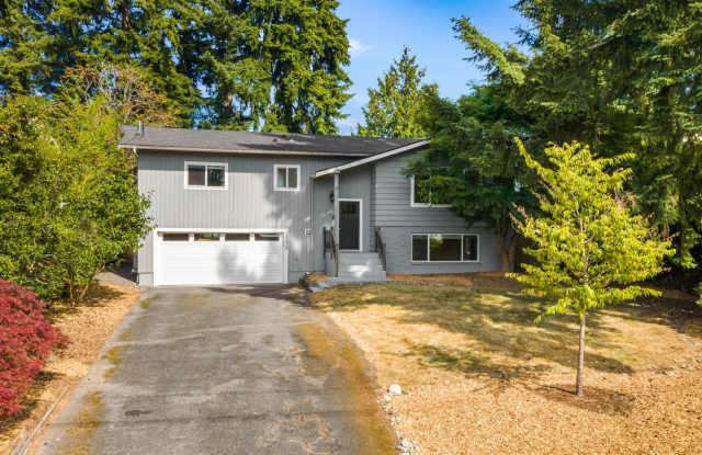 Updated Split-Level Home with Flexible Living Spaces & Backyard Deck photos photos