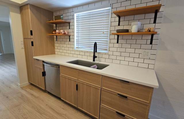 This is a must-see chic and updated townhouse in a prime location! photos photos