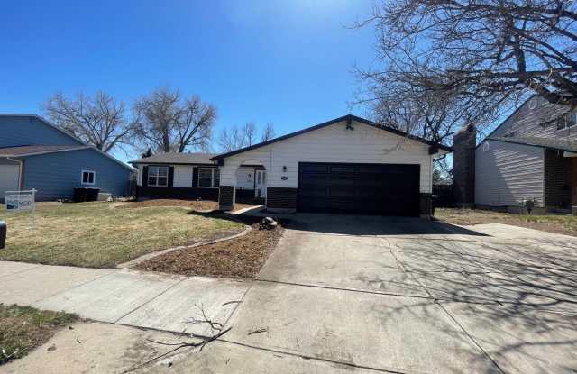 $0 DEPOSIT OPTION! 4BED/3BATH WITH HUGE FINISHED BASEMENT! COVERED BACK PATIO! BEAUTIFUL PRIMARY SUITE! IN LAKE ARBOR - 8329 Chase Drive, Arvada, CO 80003