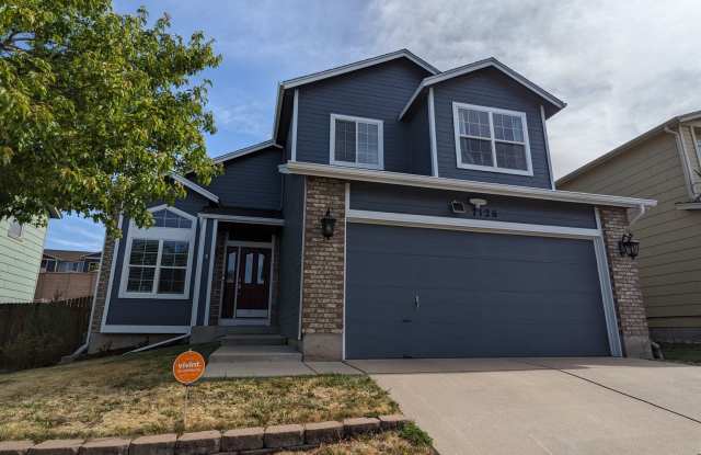 Modern large 4 bedroom/3.5 bath home with finished basement in Wagon Trails Community! photos photos