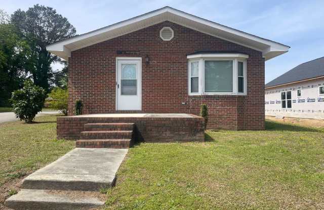 Brick Ranch- Dunn- 4 bedroom 2.5 bath- 2 car carport- Corner Lot photos photos