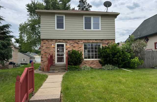 Charming 3 Bedroom Home With Fireplace and 2-Car Garage in Moline! photos photos
