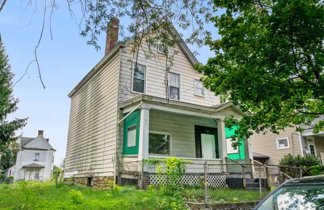 Spacious 4 Bed, 1 Bath Home w/ Bonus Rooms, Off-Street Parking - Available Now in Sheraden! photos photos