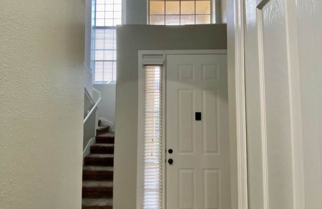 Move in NOW!WATER VIEW!! Stunning 4 bedroom + Loft, 2.5 bath Townhome Gated community in Avalon Park. 1 car attached garage. HOA handles lawn care. Primary bedroom on 1st floor. Gallery 4