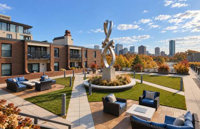 Lowry Hill 1BR w/ Skyline Views + Heated Garage | 745 SF Gallery 1