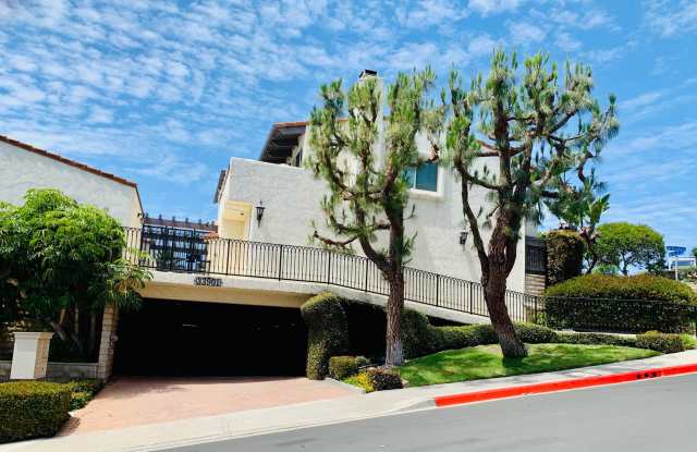 Unbeatable Location! Ocean View two bedrooms and two bathrooms two story condo with gated underground parking. photos photos
