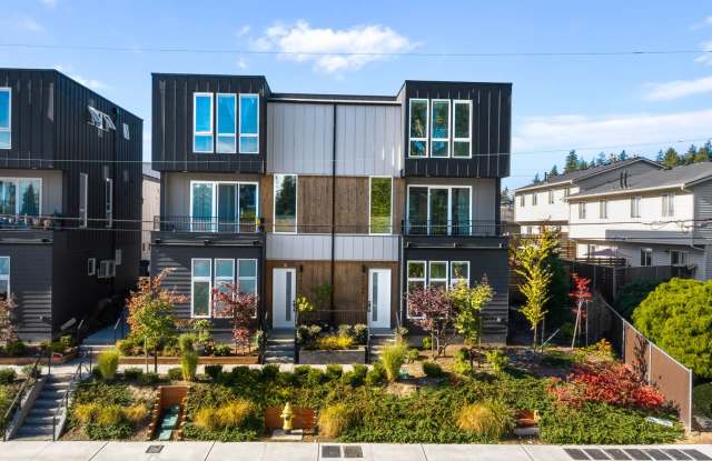 Modern Corner Home with Abundant Natural Light, Spacious Balcony & 2-Car Garage! Gallery 1