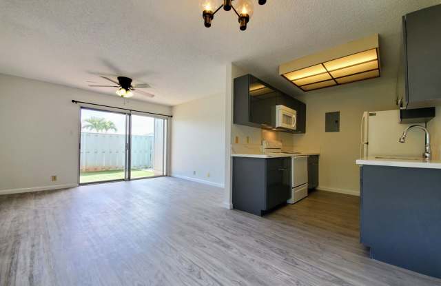 Rarely available! Upgraded ground floor 2bd, 1 bath townhome with one assigned parking photos photos