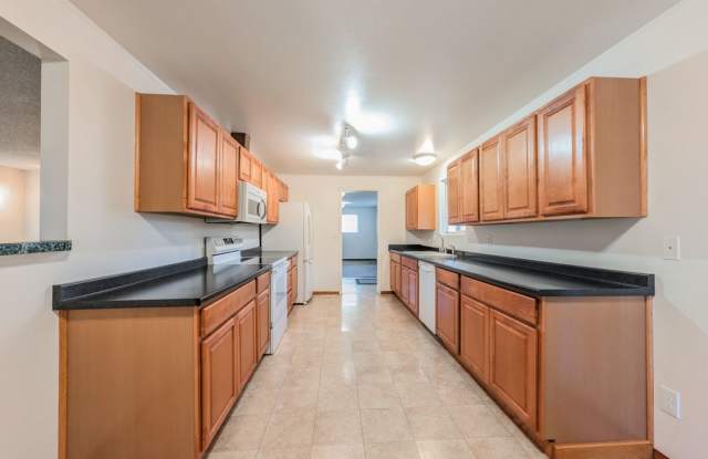 **Move-In Special**Spacious Single-Level Rambler with Fenced Yard, Bonus Room & Garage! Gallery 3