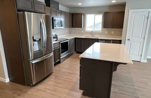 3 bed/2 bath rambler style home! Attached garage, fenced back yard & A/C! photos photos