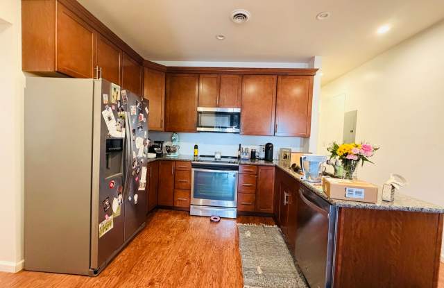 HUGE 2 Bedroom + Bonus Room + HUGE Deck + Covered Parking photos photos